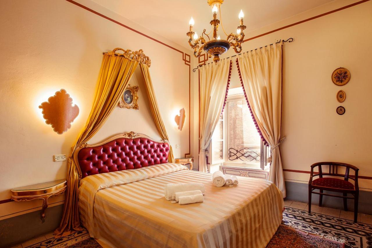 Aparthotel Palazzo Barbini Dimora Storica Castiglione del Lago Exterior foto